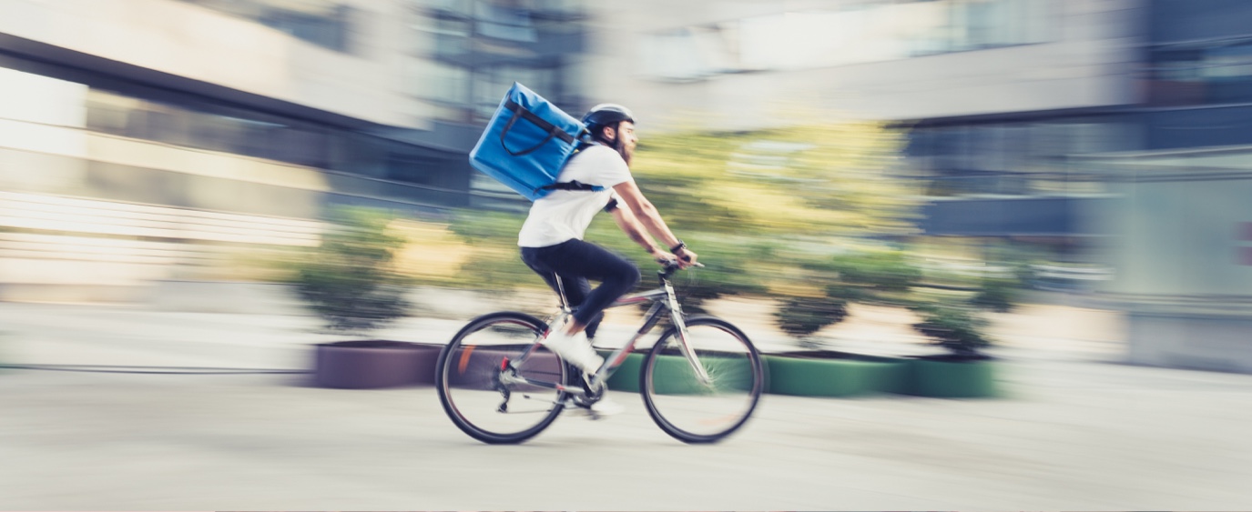 delivery man on bicycle