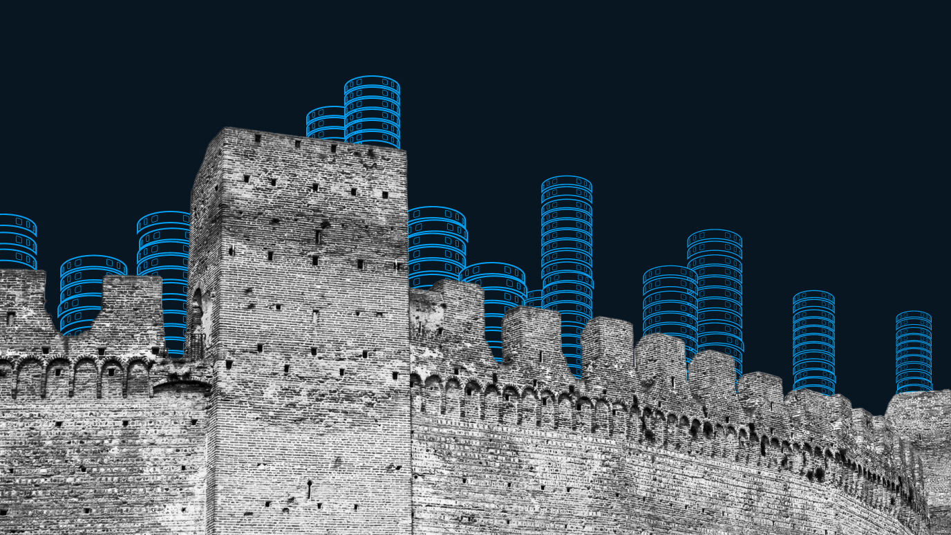 An illustrated fortress with coins stacked high behind the walls to represent the impact that defensive stocks have on your portfolio in market downturns.