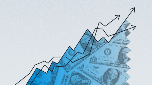 Two scales hover over a stack of money, alluding to the concept of how to profit from inflation.